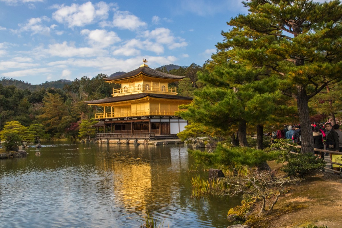 People nearing Kinkaku-ji Temple