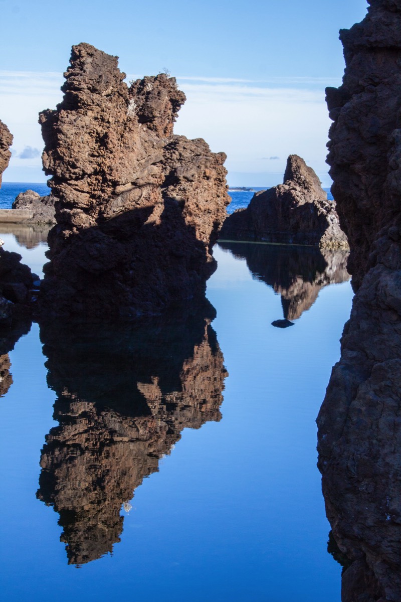 Reflection in still pool water