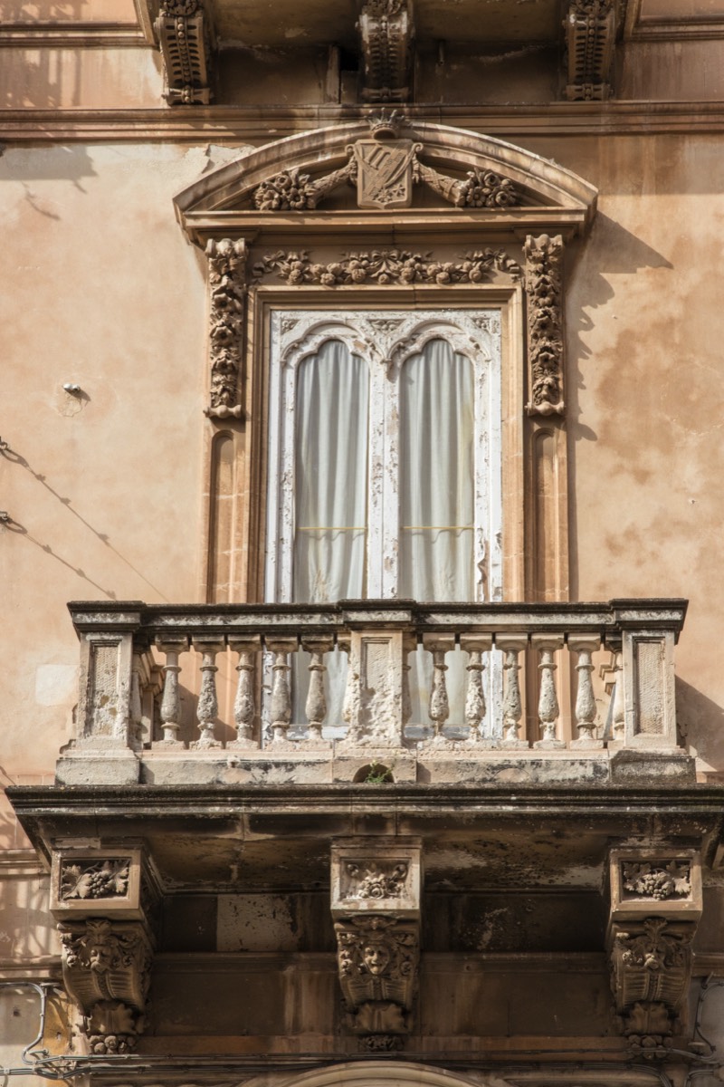 Weather-worn balcony in Syracuse