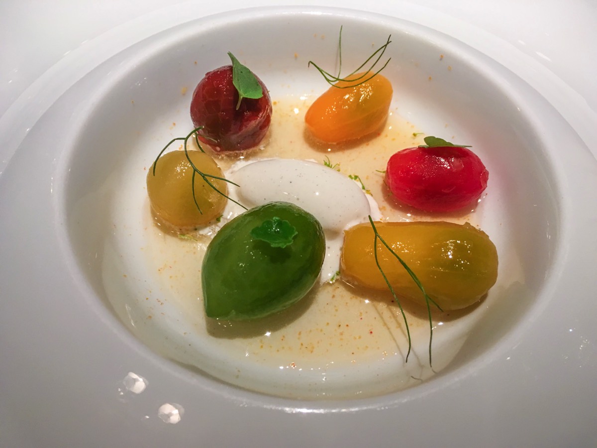 Valence, Pic : Menu "Harmonie" - La tomate plurielle : naturellement explosive - consommé glacé à la feuille de cassis et fleur de sureau - crème glacée de burrata à la vanille fumée